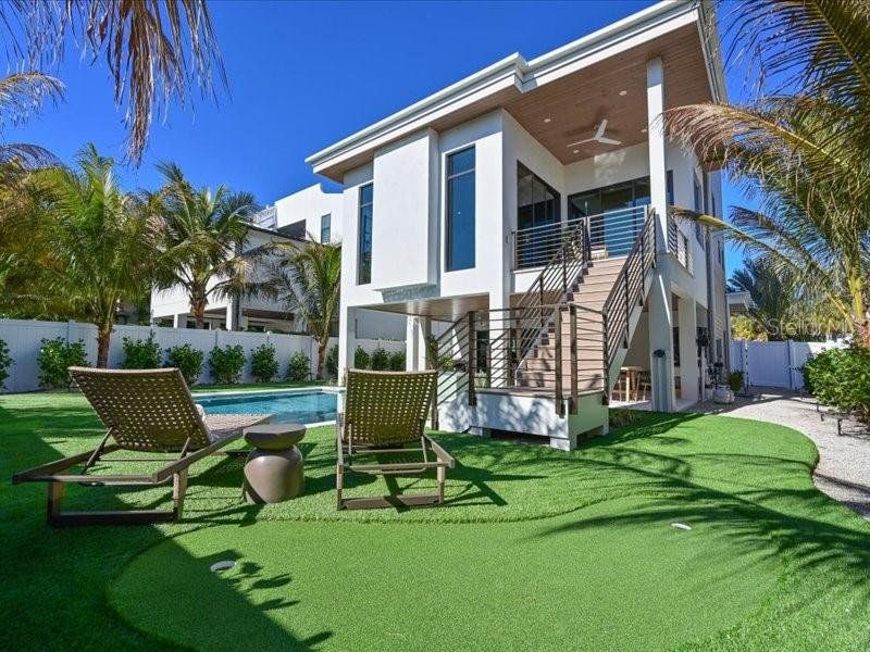 Exterior details and patio area of a home in , Anna Maria (Image 31).
