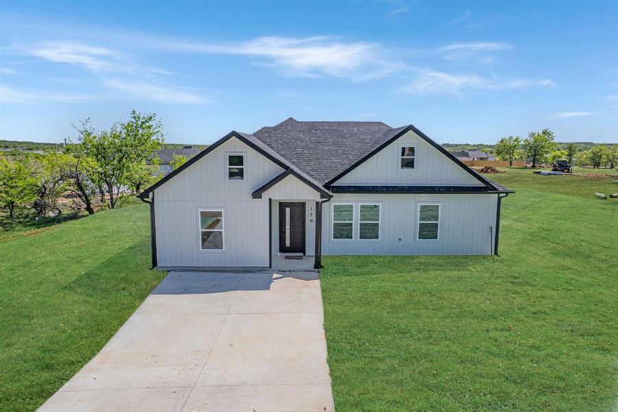 Front exterior of a new home in , Bridgeport, TX, highlighting curb appeal (Image 2). Front exterior of a new home in , Bridgeport, TX, highlighting curb appeal (Image 2).