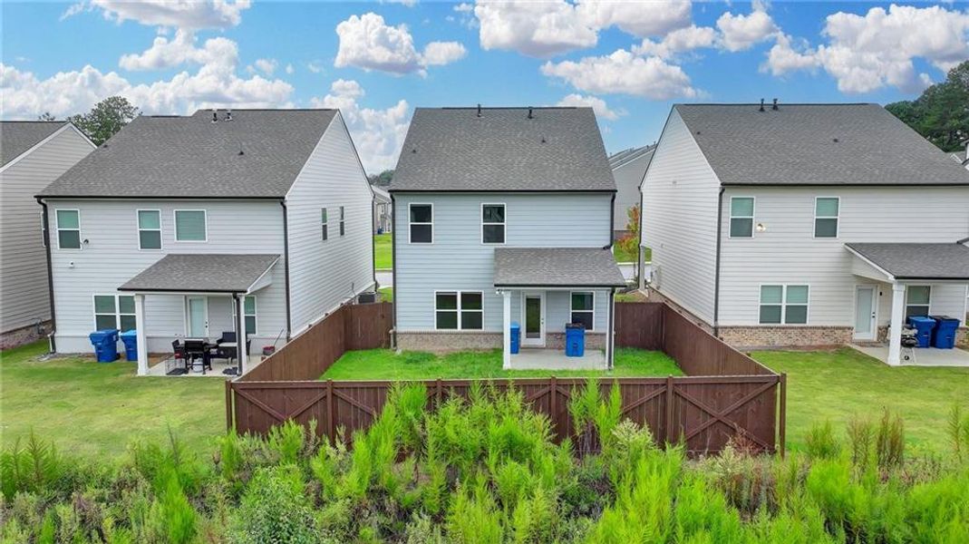 Exterior details and patio area of a home in Westgate Enclave, Loganville (Image 24).