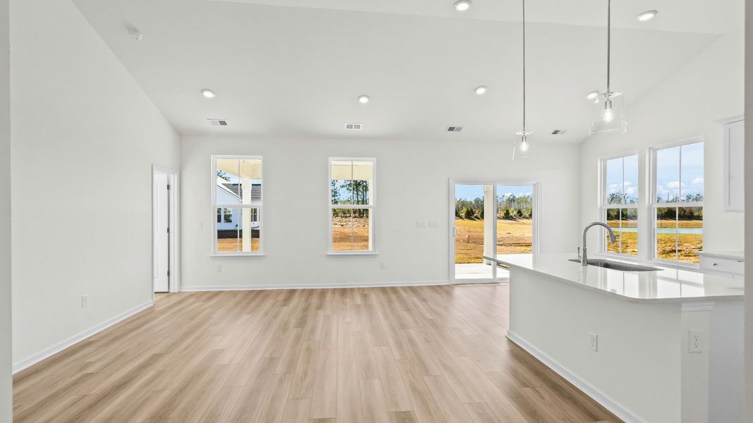 Spacious Easton living room and kitchen designed for effortless everyday living at Chestnut Farms Spacious Easton living room and kitchen designed for effortless everyday living at Chestnut Farms