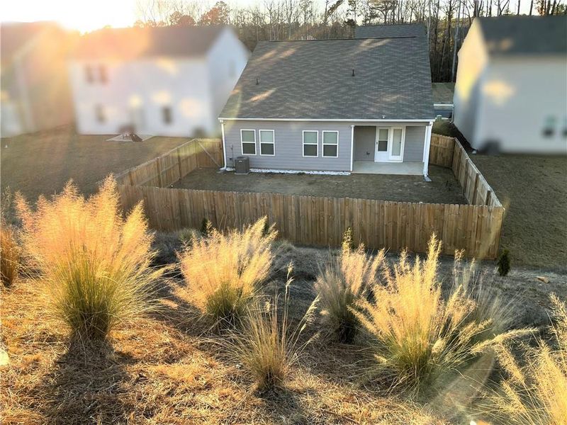 Exterior details and patio area of a home in Greyson Parc, Locust Grove (Image 3).