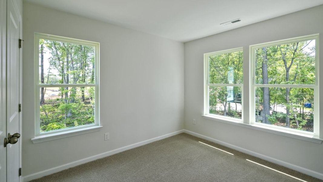 Spacious, unfurnished interior of a new home in Copper Run South, Durham (Image 23).