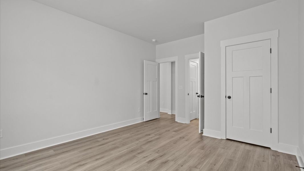 Superior hardwood flooring enhances the comfort and style of every secondary bedroom
