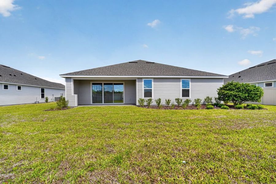 Exterior details and patio area of a home in Headwaters at Lofton Creek, Yulee (Image 23).
