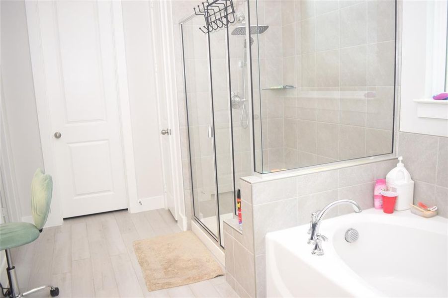 Furnished interior view inside a new home in , Hickory Creek (Image 13).