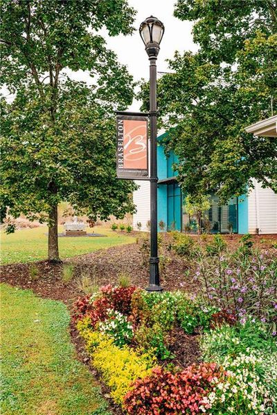 Front exterior of a new home in Rosewood Lake Estates, Hoschton, GA, highlighting curb appeal (Image 69).