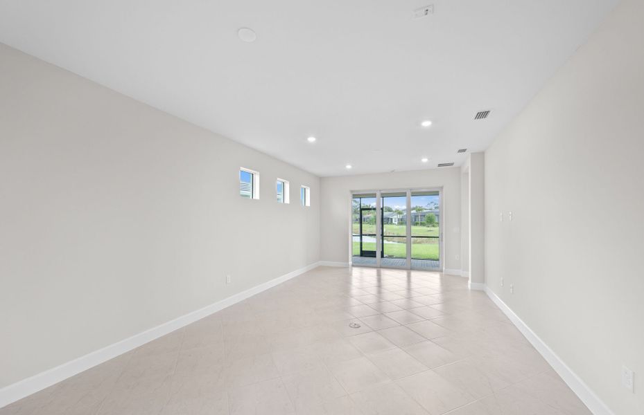 Spacious, unfurnished interior of a new home in Del Webb Oak Creek, North Fort Myers (Image 11).
