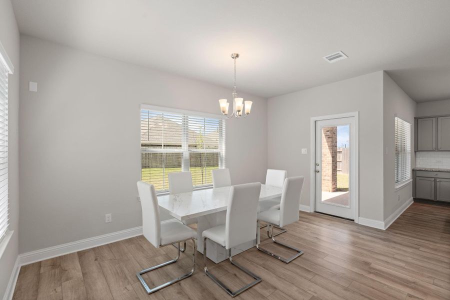 Furnished interior view inside a new home in Sunterra, Katy (Image 9).