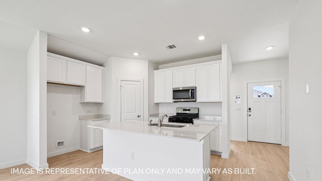 Furnished interior view inside a new home in Monarch Ranch, Manor (Image 3).