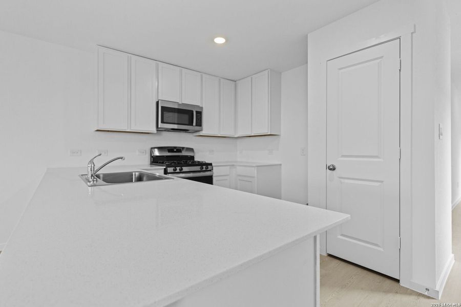 Furnished interior view inside a new home in Spring Grove, St. Hedwig (Image 7).