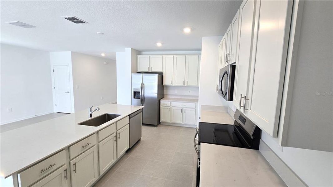 Furnished interior view inside a new home in Westview, Kissimmee (Image 7). Furnished interior view inside a new home in Westview, Kissimmee (Image 7).