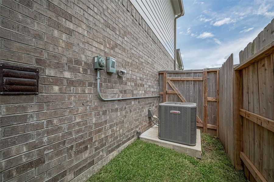 Exterior details and patio area of a home in Tavola: Gulf Coast Collection, New Caney (Image 21). Exterior details and patio area of a home in Tavola: Gulf Coast Collection, New Caney (Image 21).