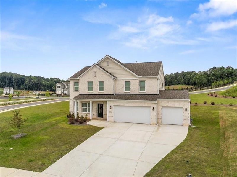 Front exterior of a new home in , Calhoun, GA, highlighting curb appeal (Image 26). Front exterior of a new home in , Calhoun, GA, highlighting curb appeal (Image 26).