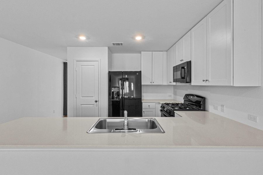 Furnished interior view inside a new home in Sunset Oaks, San Marcos (Image 8).