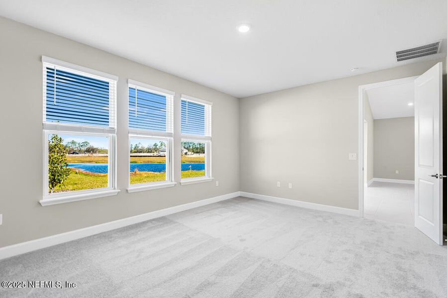 Spacious, unfurnished interior of a new home in Colbert Landings, Palm Coast (Image 38).