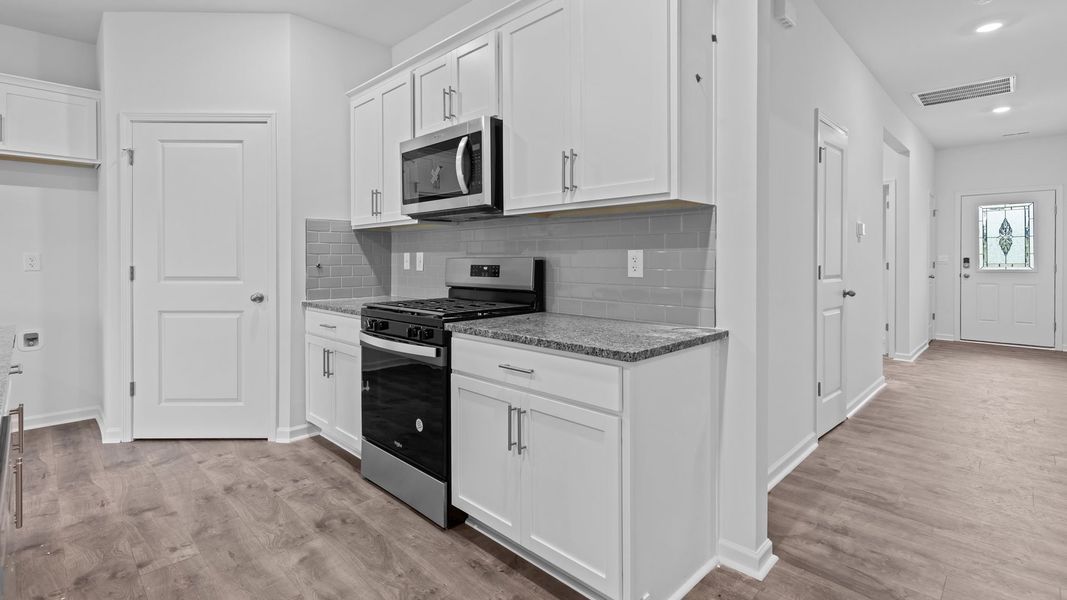 Furnished interior view inside a new home in West New Bern, New Bern (Image 6).