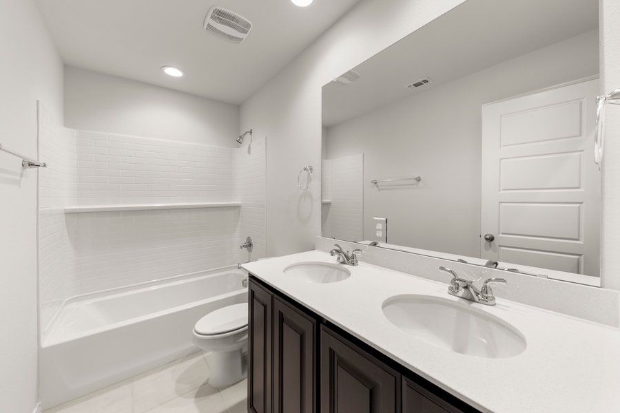 Representative exterior photo of a completed home built from the Cheyenne by Impression Homes in DeBerry Reserve, Royse City, TX (Image 16).