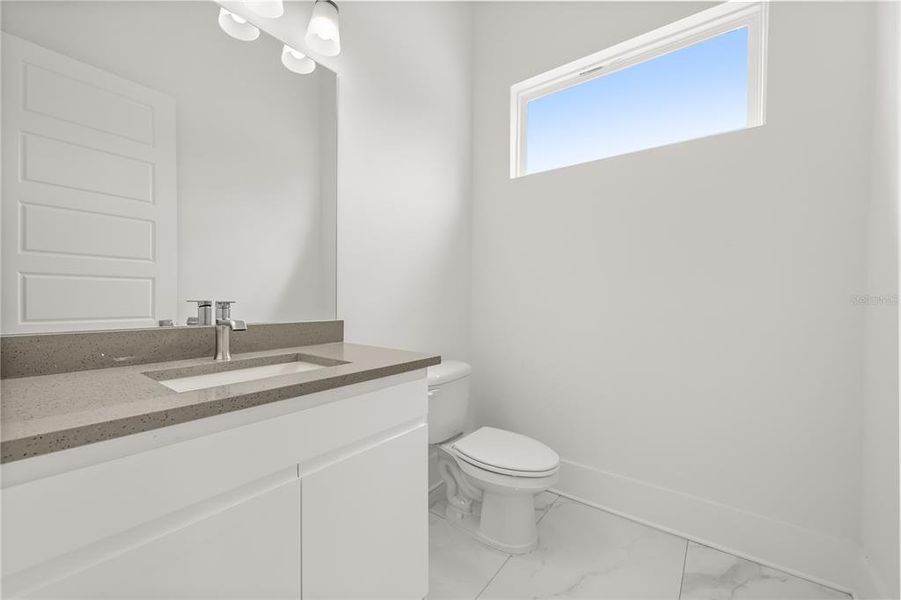 Furnished interior view inside a new home in , Kissimmee (Image 8).