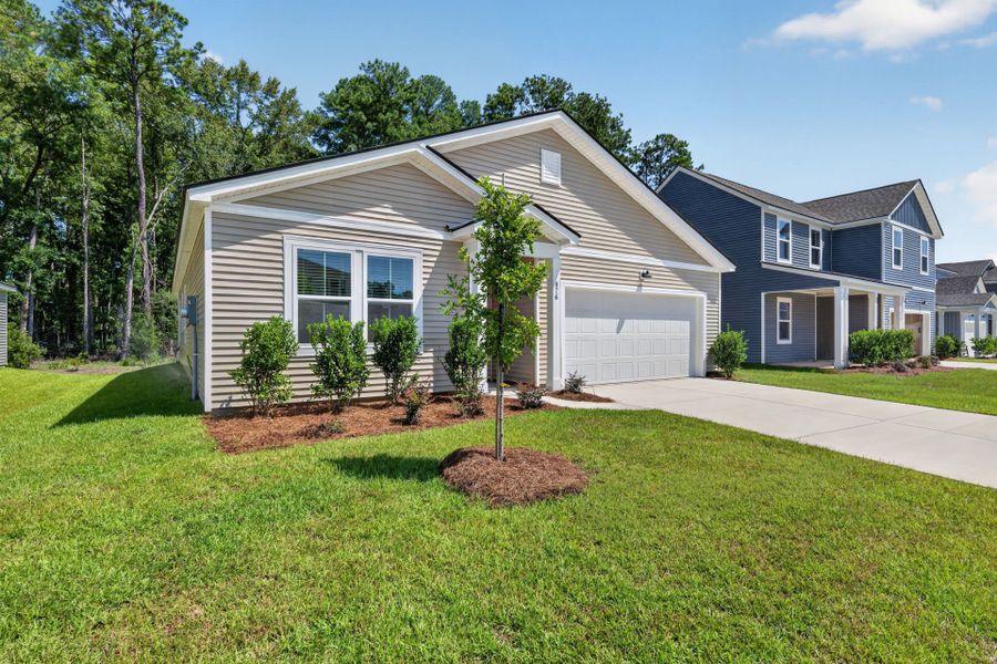 Front exterior of a new home in Bradford Pointe, Summerville, SC, highlighting curb appeal (Image 17).