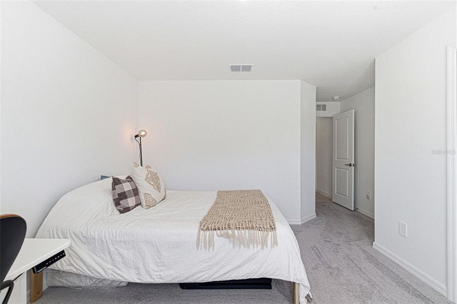 Furnished interior view inside a new home in North Park Isle, Plant City (Image 51).
