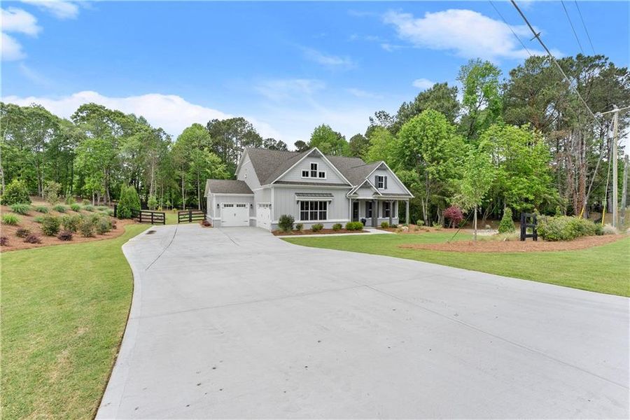 Front exterior of a new home in , Gainesville, GA, highlighting curb appeal (Image 34).