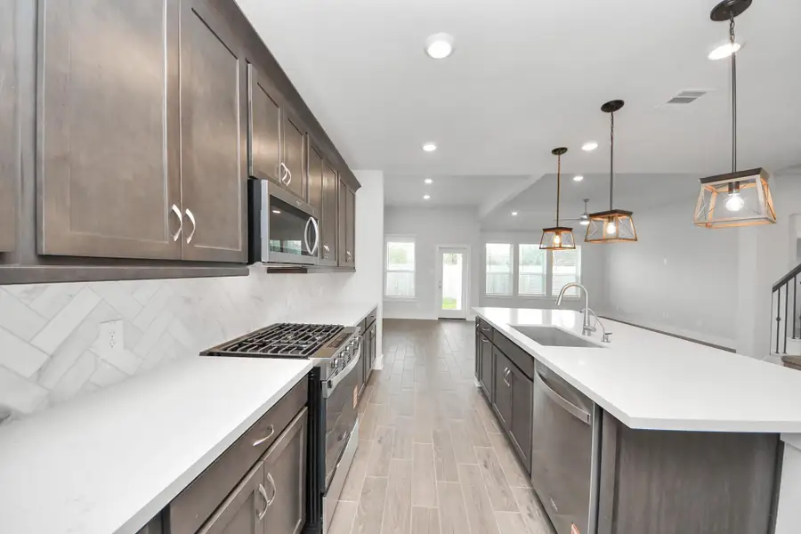 Furnished interior view inside a new home in Laurel Landing: Landmark Collection, Alvin (Image 5).