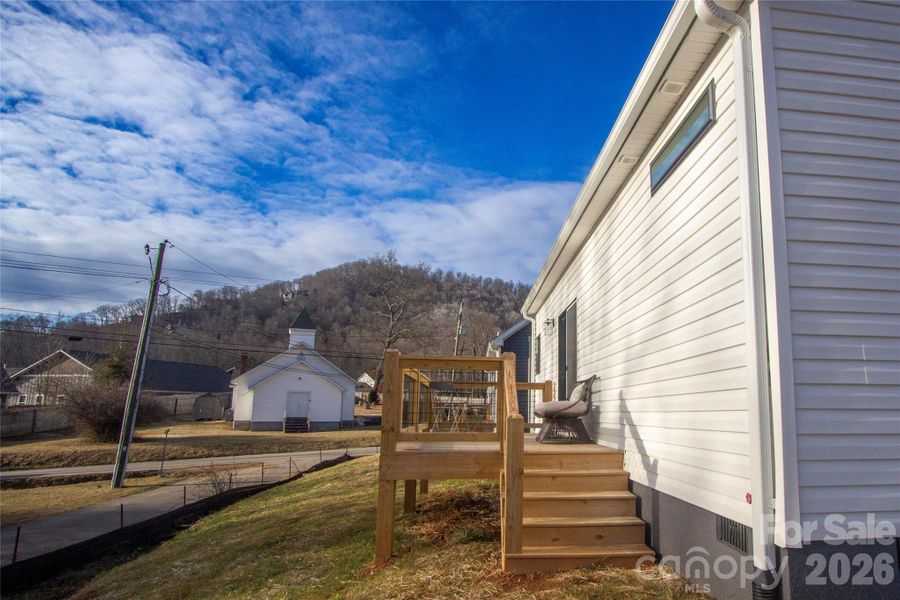 Exterior details and patio area of a home in , Arden (Image 24).
