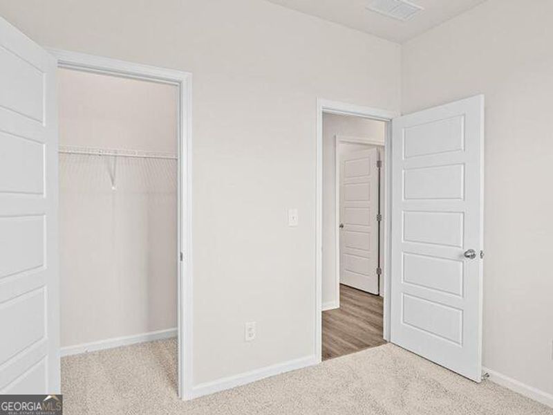Spacious, unfurnished interior of a new home in Remington Chase, Perry (Image 19).