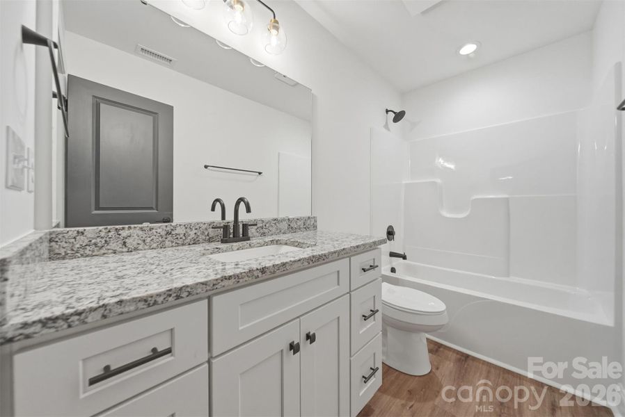 Furnished interior view inside a new home in , Hickory (Image 7).