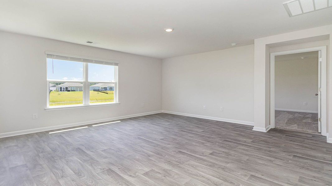 Representative unfurnished interior of a home built from the CALI by D.R. Horton in Heritage Crossing, Conway (Image 18).