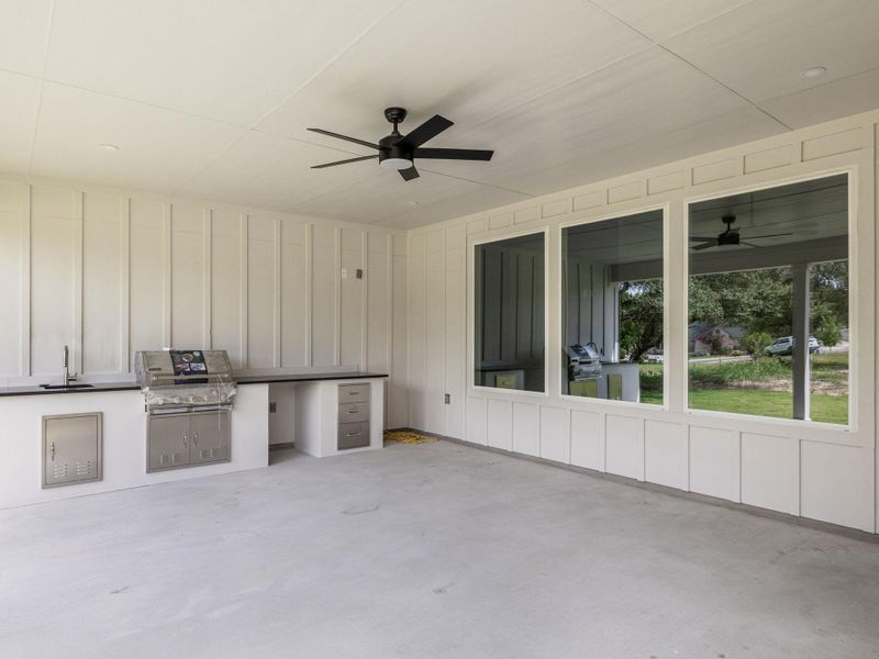 Large back patio with outdoor grill and sink area Large back patio with outdoor grill and sink area