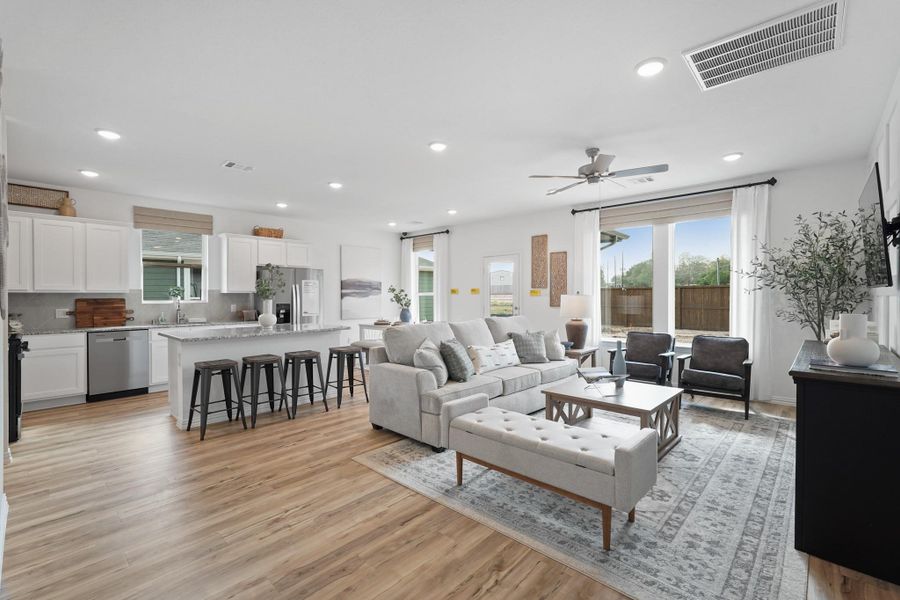 Designed for daily life, the family room combines style and comfort, with plenty of room for family activities, cozy evenings, or entertaining guests. Its thoughtful layout and bright ambiance make it a true gathering hub.