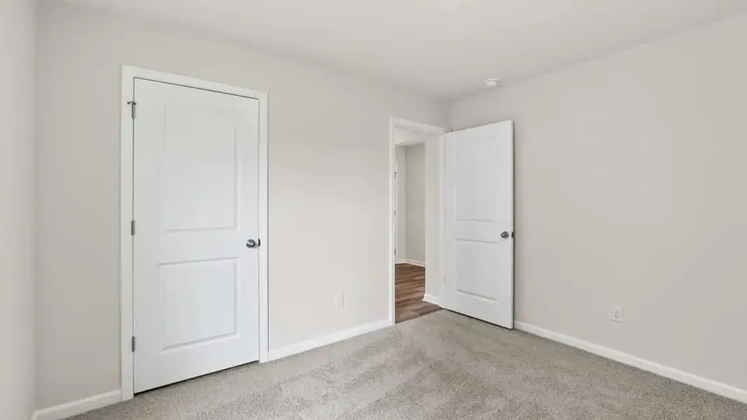 Spacious, unfurnished interior of a new home in Waverly Station, Greenwood (Image 22).