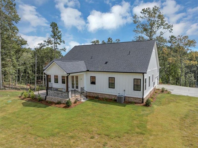 Front exterior of a new home in , Ball Ground, GA, highlighting curb appeal (Image 2).