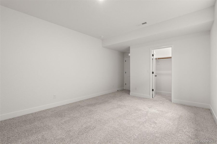 Spacious, unfurnished interior of a new home in Wolf Ranch - Enclave Collection, Colorado Springs (Image 37).