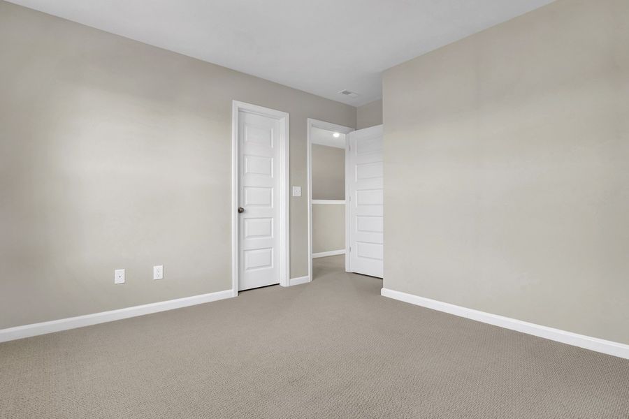 Spacious, unfurnished interior of a new home in Grand Park, Leland (Image 31).