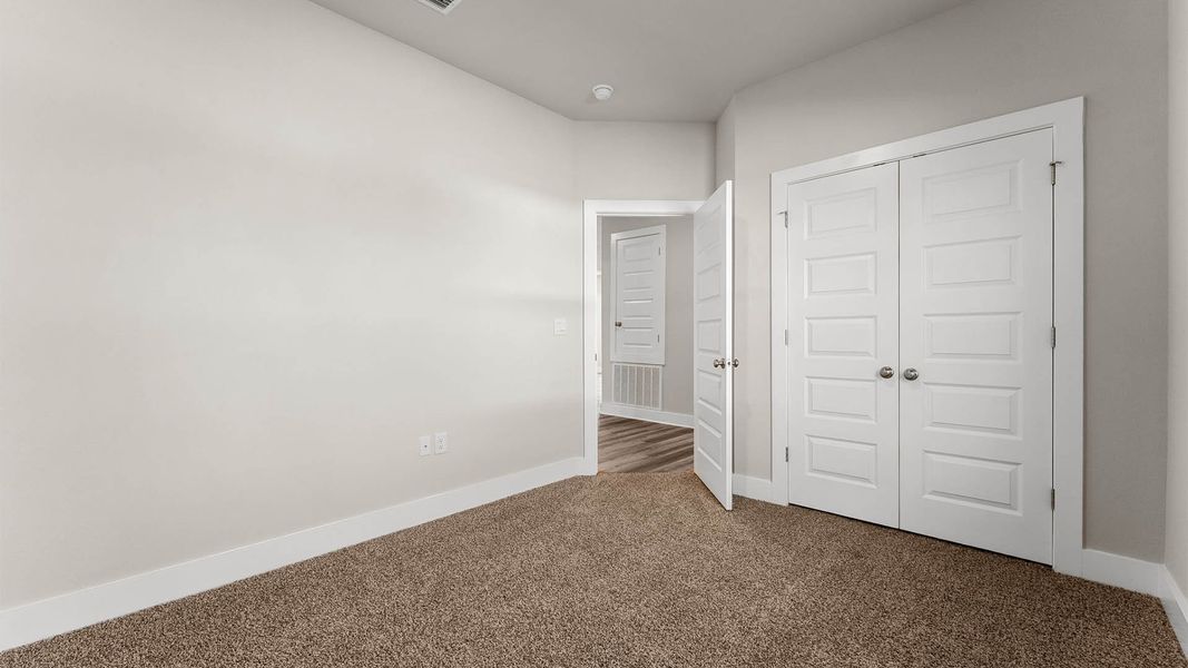 Representative unfurnished interior of a home built from the The Mckenzie by D.R. Horton in Liberty, Panama City (Image 37).