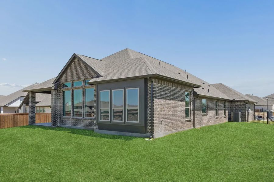 Exterior details and patio area of a home in Silo Mills, Joshua (Image 4).