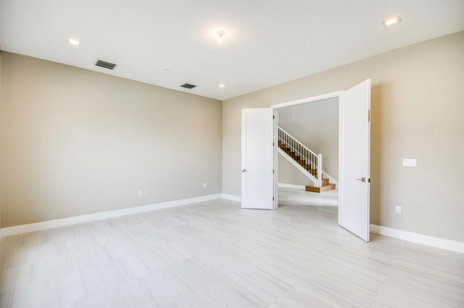 Furnished interior view inside a new home in Apex at Avenir, Palm Beach Gardens (Image 42).