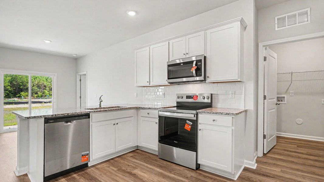 Furnished interior view inside a new home in The Meadows at Wildwood Village, Shallotte (Image 6).