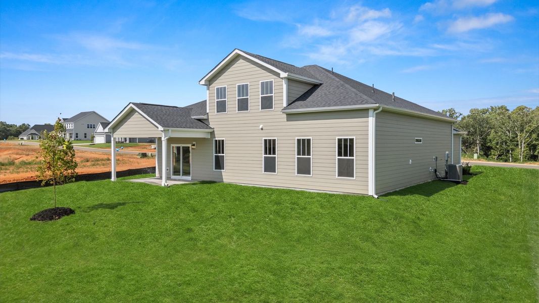Front exterior of a new home in Pinebrook, Woodruff, SC, highlighting curb appeal (Image 18).