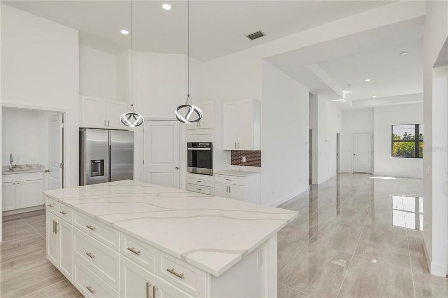 Furnished interior view inside a new home in , Port Charlotte (Image 13).