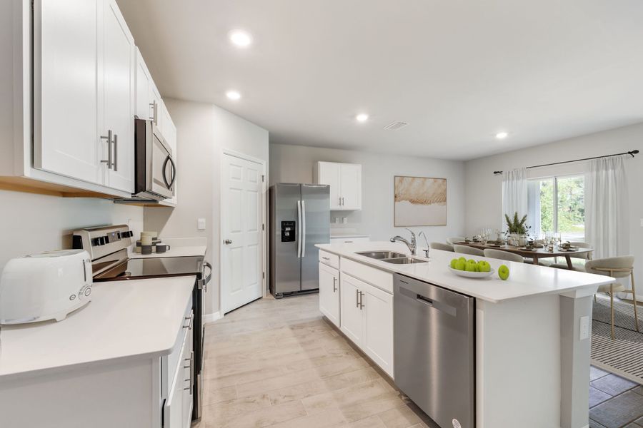 Representative furnished interior of a home built from the CALI by D.R. Horton in LaBelle Homes, Lehigh Acres (Image 5).
