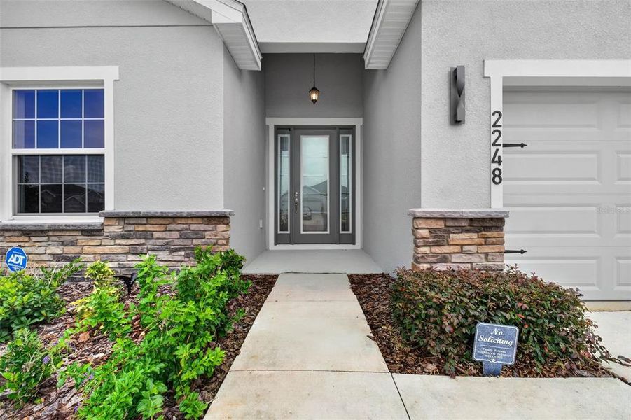 Exterior details and patio area of a home in , Davenport (Image 33).
