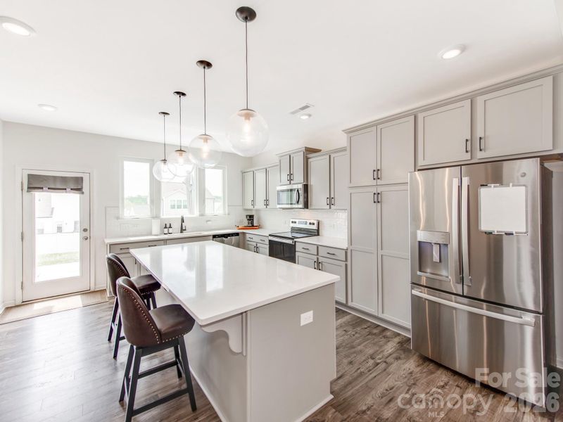 Furnished interior view inside a new home in Sutter's Mill II, Troutman (Image 33).