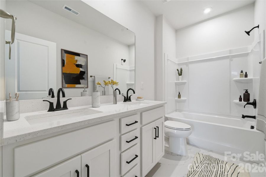 Example Photo Example Photo