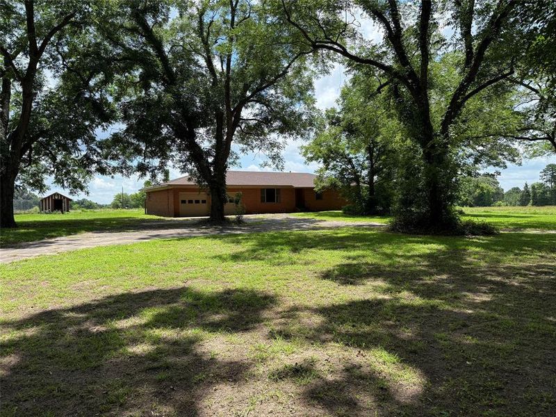 Front exterior of a new home in , Scroggins, TX, highlighting curb appeal (Image 1). Front exterior of a new home in , Scroggins, TX, highlighting curb appeal (Image 1).