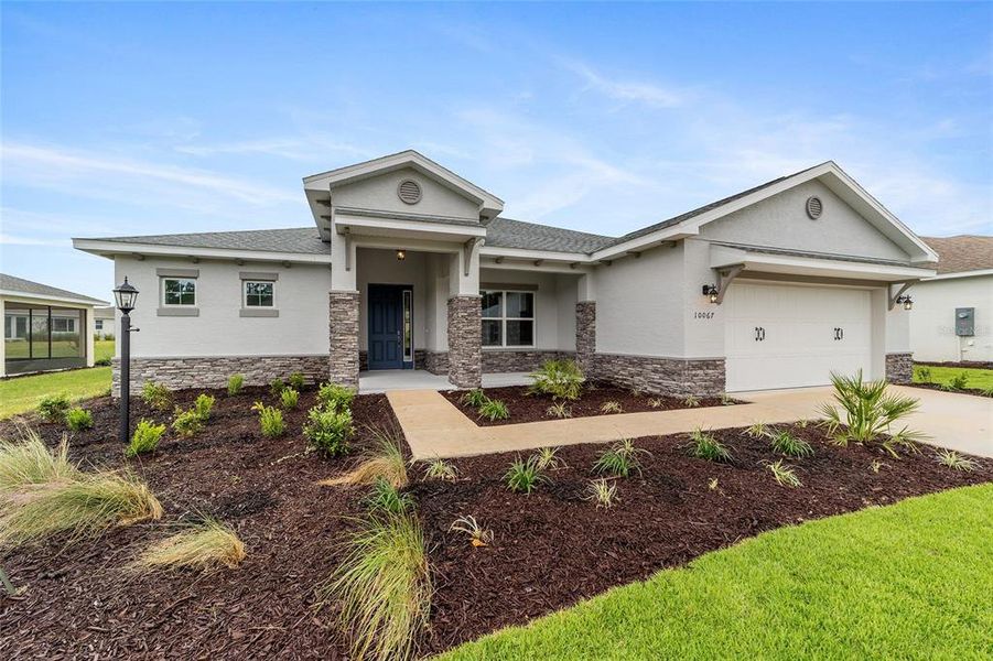 Front exterior of a new home in , Ocala, FL, highlighting curb appeal (Image 20).