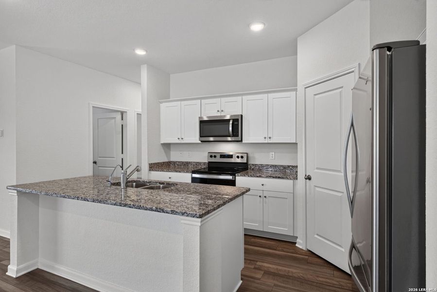Furnished interior view inside a new home in Hennersby Hollow, San Antonio (Image 5).