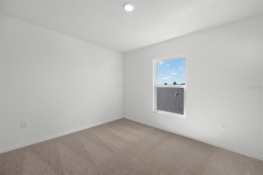 Spacious, unfurnished interior of a new home in Peach Crossings, Winter Haven (Image 27).